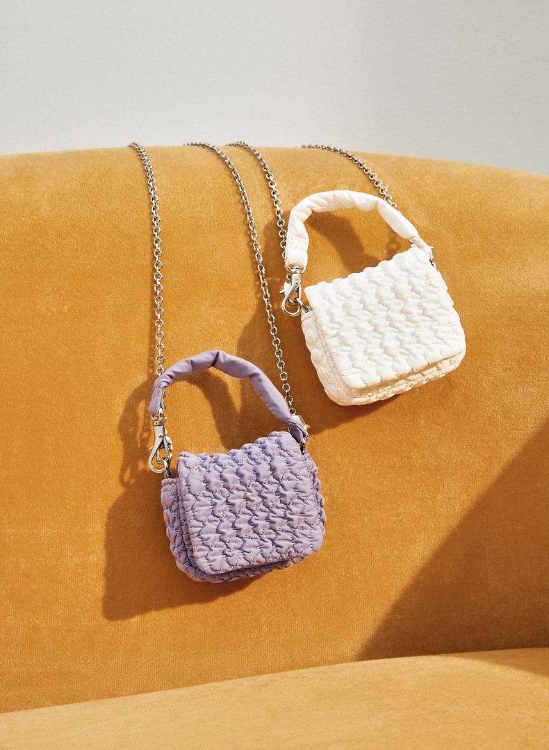 40到50岁女人适合背什么包包,40岁女性背什么牌子的包包