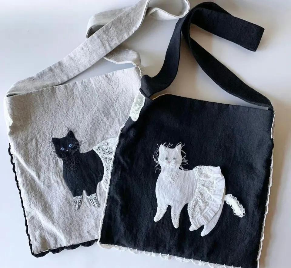 猫咪刺绣帆布包,猫咪揣手款包