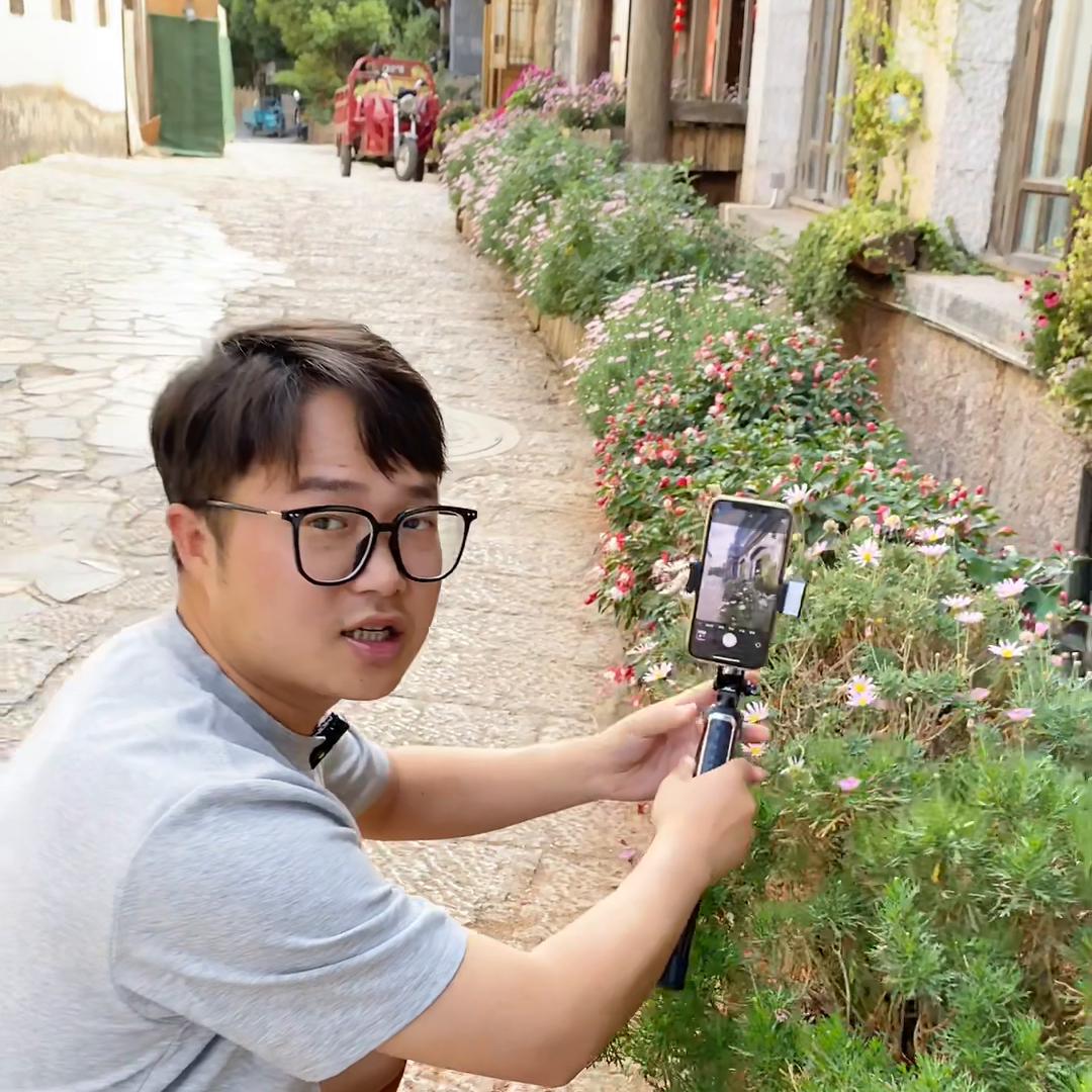 怎样用自拍杆给自己拍视频,用自拍杆怎样录像视频