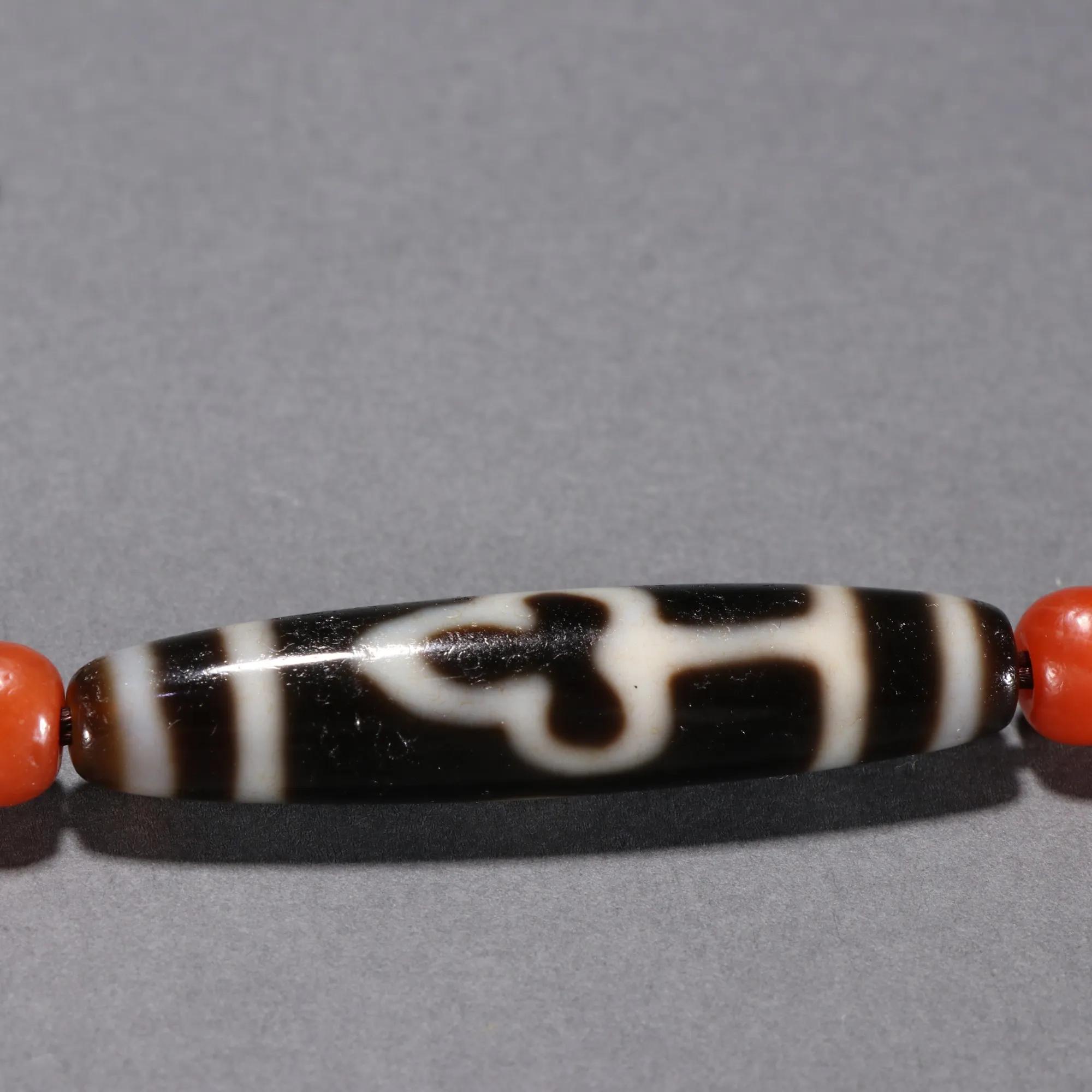 藏传虎牙玛瑙天珠款式,藏式天然玛瑙三眼算盘天珠